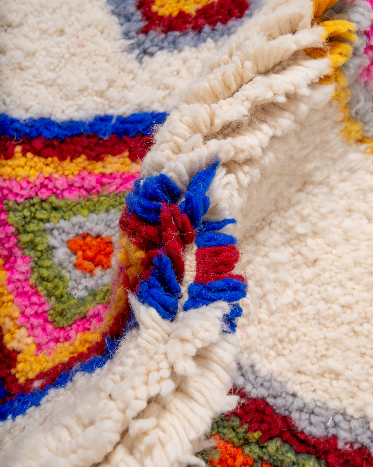 Modern, designer, handcrafted Berber rug from Morocco. Beniourain carpet with beautiful colours and patterns and fluffy wool texture.